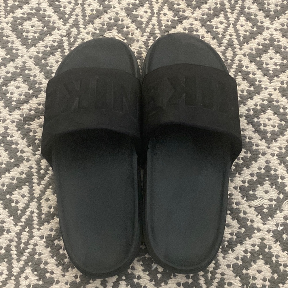 Black Nike slides